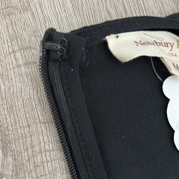 Black pleated front romper with lace trim sleeves and neck line - Picture 9 of 10